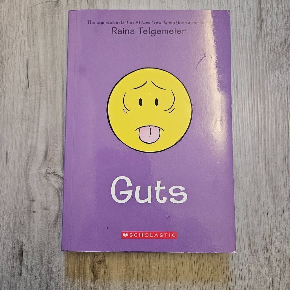Guts: A Graphic Novel Paperback Book by Raina Telgemeier